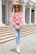 Cargar imagen en el visor de la galería, Suéter rosado oversized corazones Large

