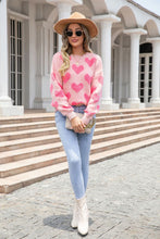 Cargar imagen en el visor de la galería, Suéter rosado oversized corazones Large
