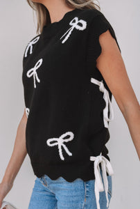 Blusa negra con moñitas S