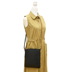 Cartera crossbody expandible de cuero